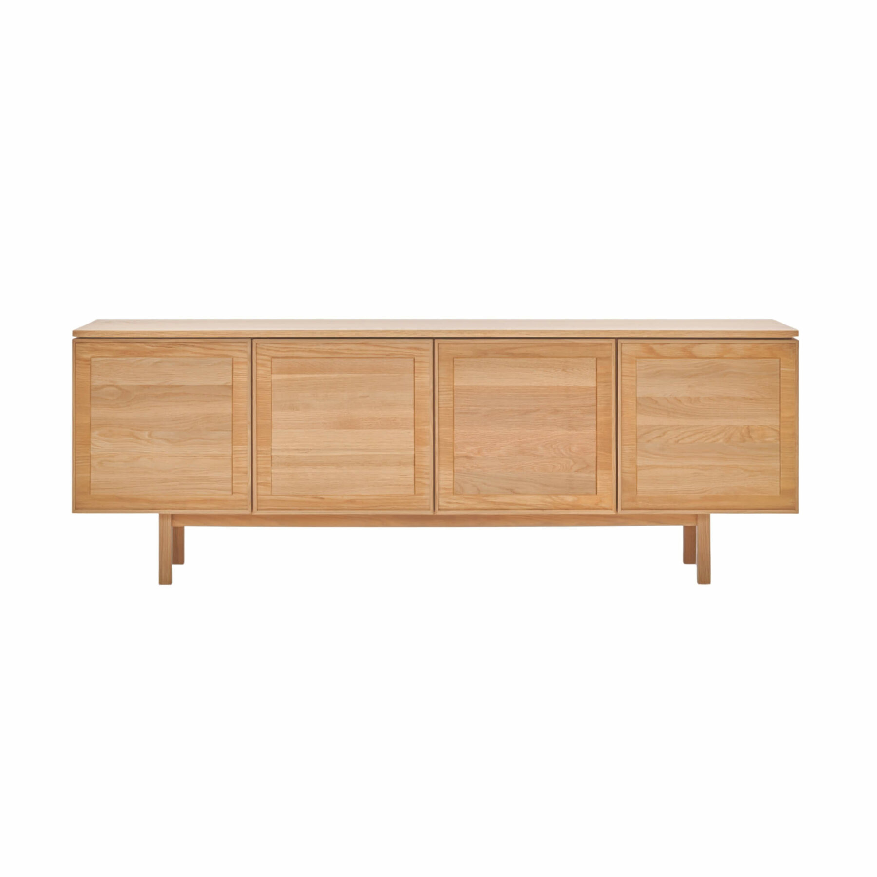 Yorke by Tolv designer sideboard in light oak with panelled door fronts and slim timber legs.